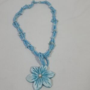 Carved Mother of Pearl Hawaiian Plumeria Flower Pendant Blue Beaded Necklace